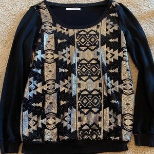 Black long sleeve Maurice’s top with gold sequins